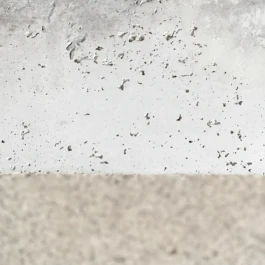 Texture detail of bespoke white concrete table at Saint-Jean Bakery in Amsterdam by IJarchitecture. 